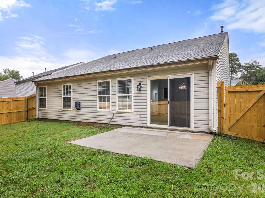 1940 Waters Trail Drive, Charlotte, NC 28216.  MLS# CAR4418345, YatesRealty ID 53063. Backyard Patio.