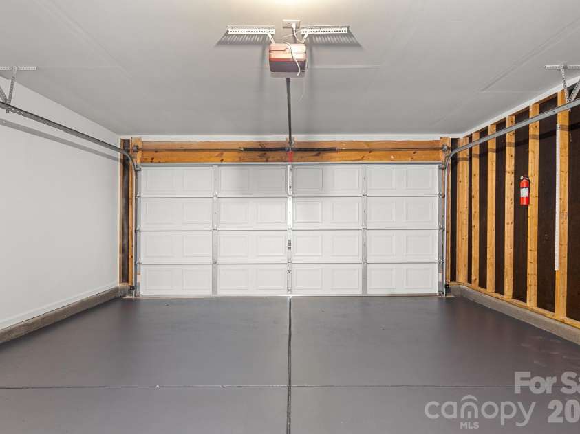1940 Waters Trail Drive, Charlotte, NC 28216.  MLS# CAR4418345, YatesRealty ID 53063. Garage Floor Finished