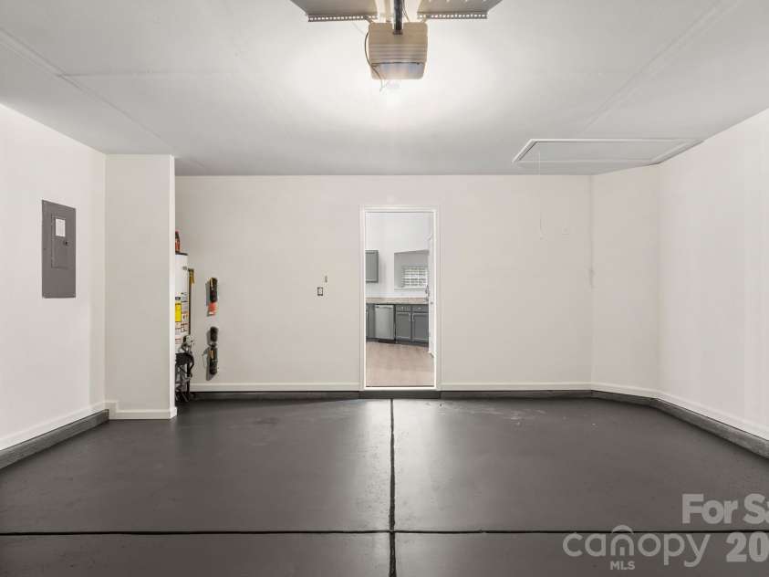 1940 Waters Trail Drive, Charlotte, NC 28216.  MLS# CAR4418345, YatesRealty ID 53063. Garage Floor Finished
