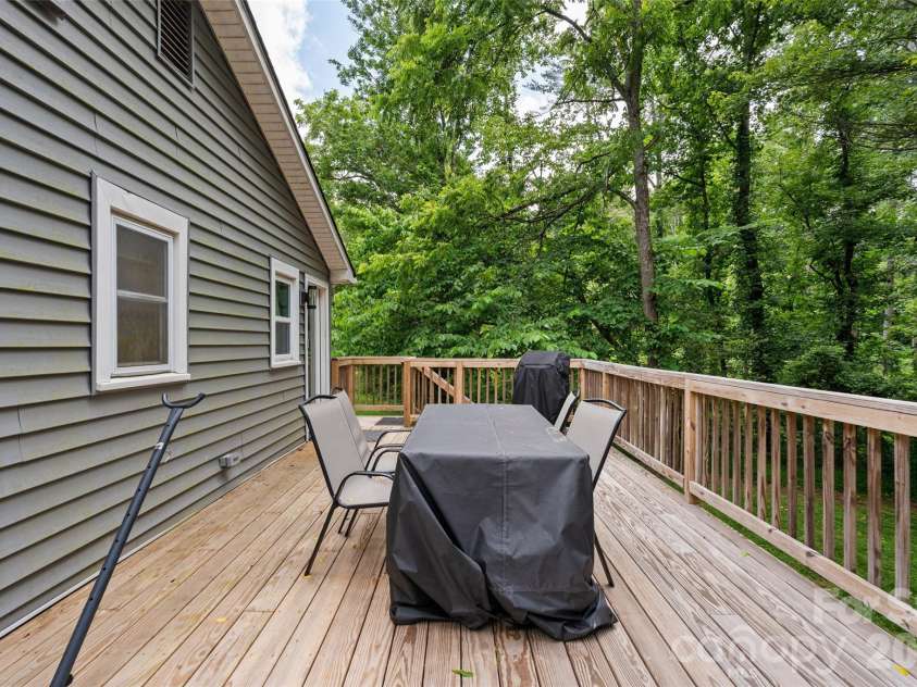 334 Mills Gap Road, Asheville, NC 28803.  MLS# CAR4322358, YatesRealty ID 5307. Back deck