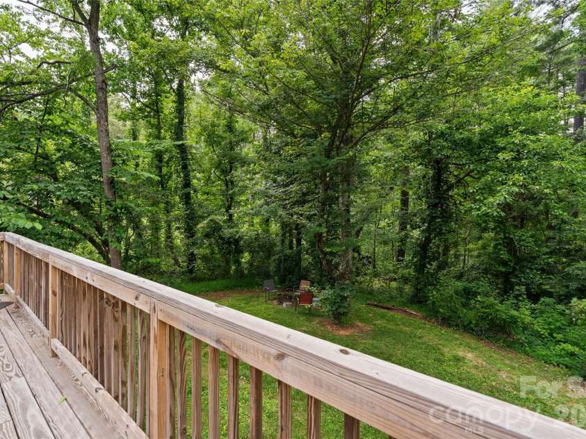 334 Mills Gap Road, Asheville, NC 28803.  MLS# CAR4322358, YatesRealty ID 5307. Back deck overlooking side/backyard