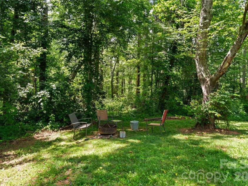 334 Mills Gap Road, Asheville, NC 28803.  MLS# CAR4322358, YatesRealty ID 5307. Side/back yard
