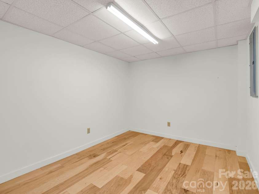 145 Stone Hedge Lane, Tryon, NC 28782.  MLS# CAR4428268, YatesRealty ID 53072. Basement flex room