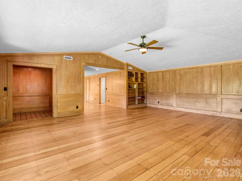 145 Stone Hedge Lane, Tryon, NC 28782.  MLS# CAR4428268, YatesRealty ID 53072. Front entry on the left built-ins on the right