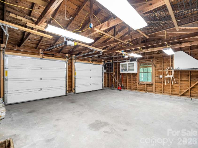 145 Stone Hedge Lane, Tryon, NC 28782.  MLS# CAR4428268, YatesRealty ID 53072. Garage interior