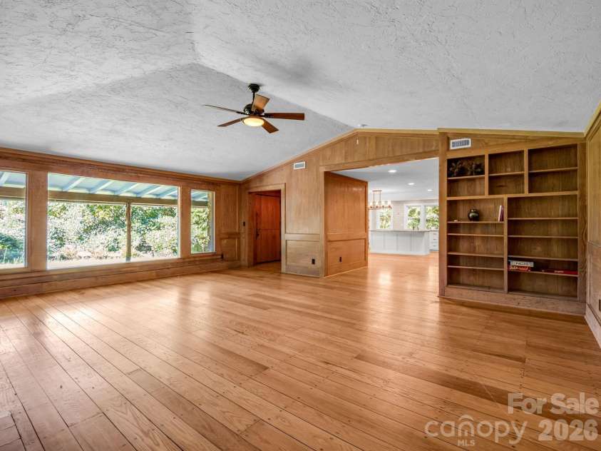 145 Stone Hedge Lane, Tryon, NC 28782.  MLS# CAR4428268, YatesRealty ID 53072. Looking back towards the dining area and kitchen