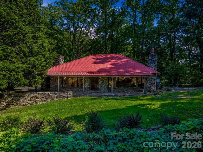 145 Stone Hedge Lane, Tryon, NC 28782.  MLS# CAR4428268, YatesRealty ID 53072. Stone exterior