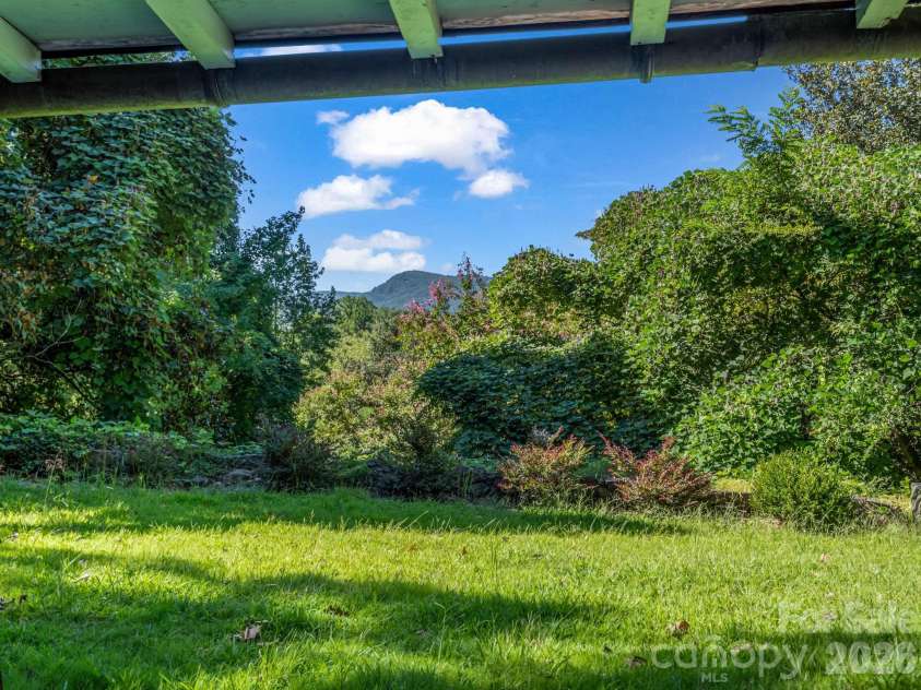 145 Stone Hedge Lane, Tryon, NC 28782.  MLS# CAR4428268, YatesRealty ID 53072. Views from the front porch