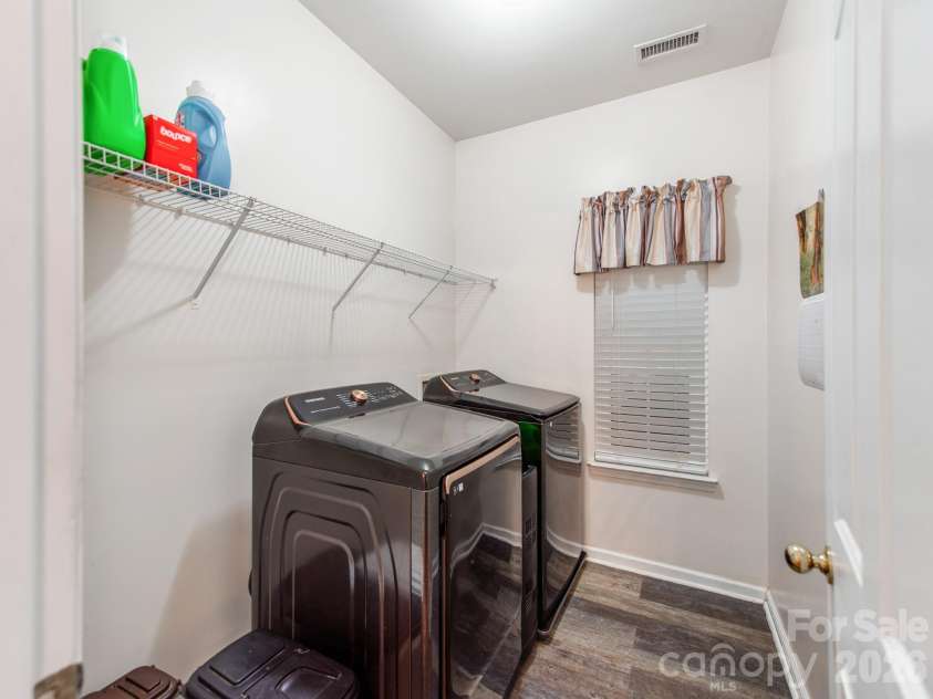 7313 Hannah Alexander Lane, Mint Hill, NC 28227.  MLS# CAR4422881, YatesRealty ID 53079. Main level laundry room