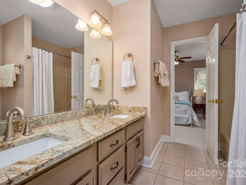 85 Laurel Creek Drive, Asheville, NC 28803.  MLS# CAR4240999, YatesRealty ID 5308. Jack and Jill bathroom between second and third bedrooms