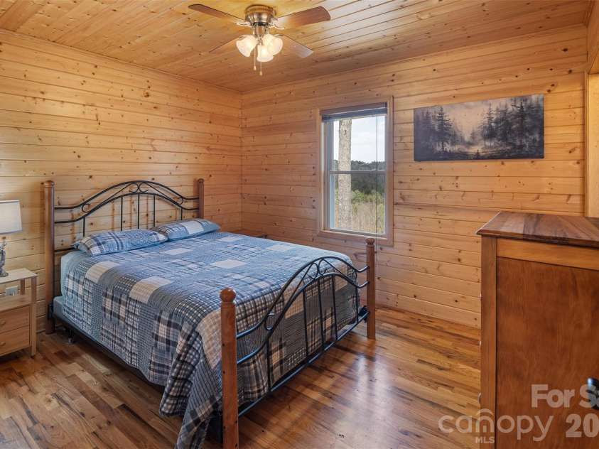 128 Deer Antler Drive, Purlear, NC 28665.  MLS# CAR4360254, YatesRealty ID 5309. Primary Bedroom with Ensuite Bathroom