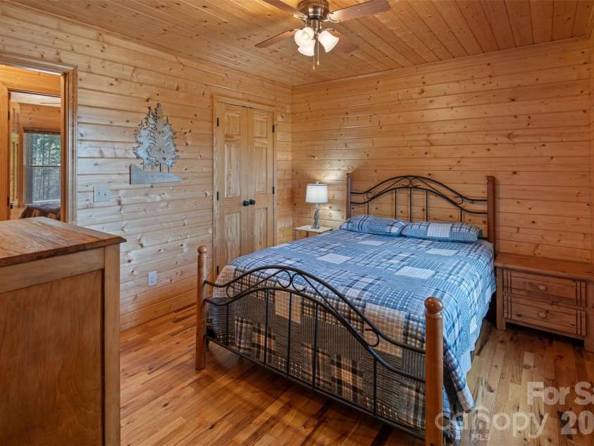 128 Deer Antler Drive, Purlear, NC 28665.  MLS# CAR4360254, YatesRealty ID 5309. Primary Bedroom with Ensuite Bathroom