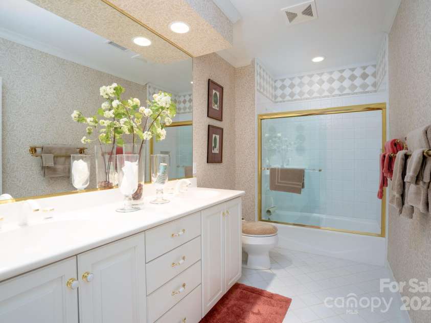 345 Porters Glen None, New London, NC 28127.  MLS# CAR4241295, YatesRealty ID 5309. Lower Level Guest Bath