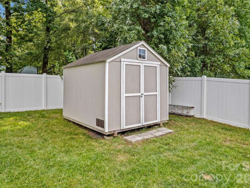 111 Paradise Hills Circle, Mooresville, NC 28115.  MLS# CAR4428377, YatesRealty ID 53114. Storage Building