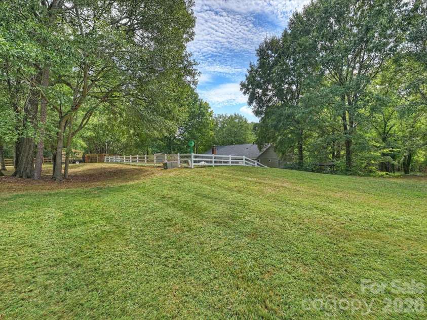 1608 Running Brook Road, Charlotte, NC 28214.  MLS# CAR4424318, YatesRealty ID 53115. Back Yard