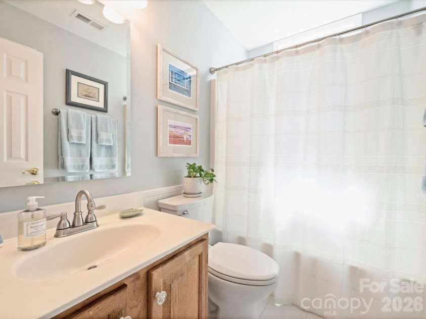 1608 Running Brook Road, Charlotte, NC 28214.  MLS# CAR4424318, YatesRealty ID 53115. Guest Bathroom