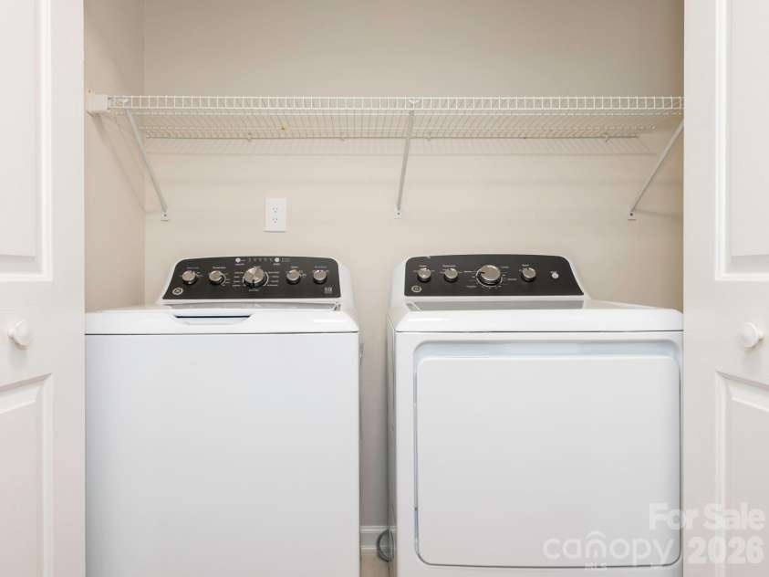 1207 Matthews Plantation Drive, Matthews, NC 28105.  MLS# CAR4428442, YatesRealty ID 53119. Laundry on Main Level
