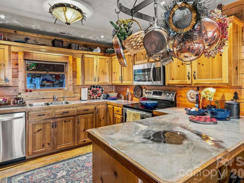 155 Hickory Nut Lane, Lake Lure, NC 28746.  MLS# CAR4409899, YatesRealty ID 53137. 