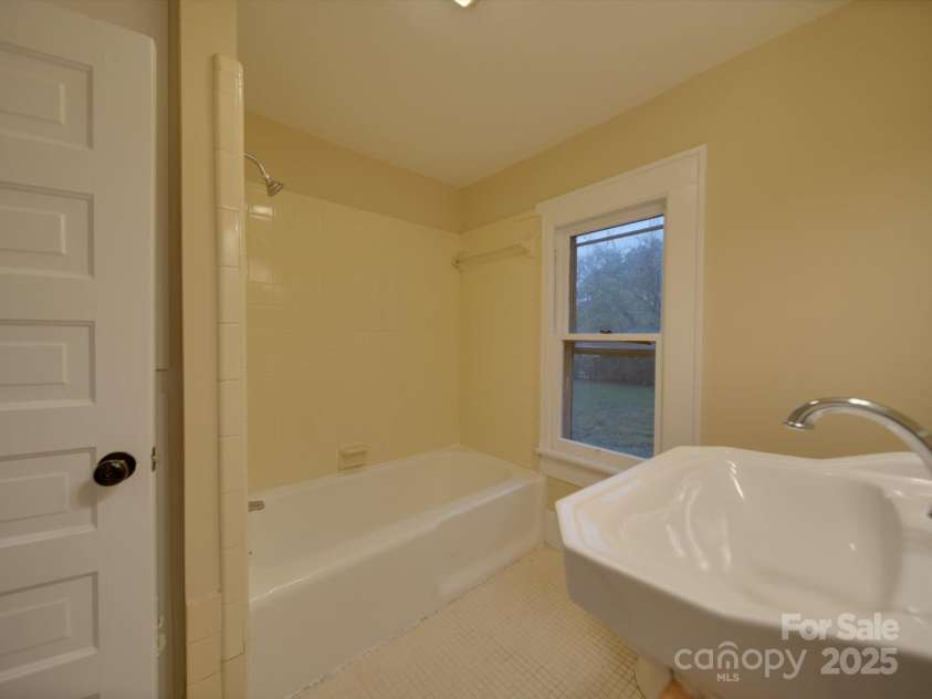 126 Division Avenue, Salisbury, NC 28144.  MLS# CAR4200804, YatesRealty ID 5314. Downstairs bathroom