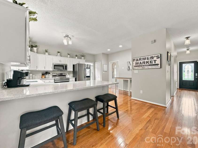 6057 Gold Creek Estate Drive, Hickory, NC 28601.  MLS# CAR4426756, YatesRealty ID 53161. Kitchen with Dining Area