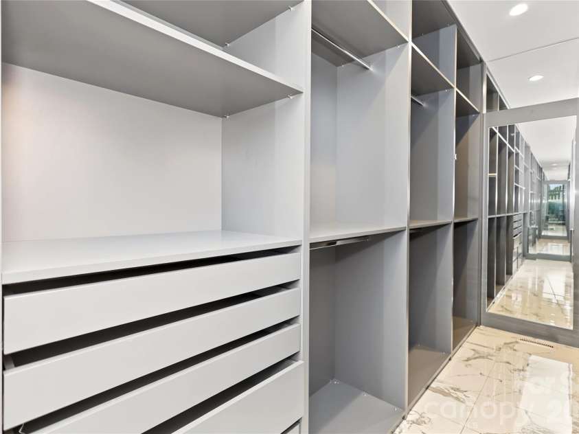 5235 Haynes Hall Place, Charlotte, NC 28270.  MLS# CAR4428075, YatesRealty ID 53175. Primary Custom Closet