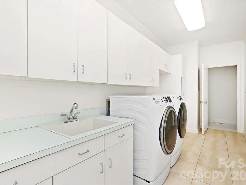 5235 Haynes Hall Place, Charlotte, NC 28270.  MLS# CAR4428075, YatesRealty ID 53175. Spacious Laundry