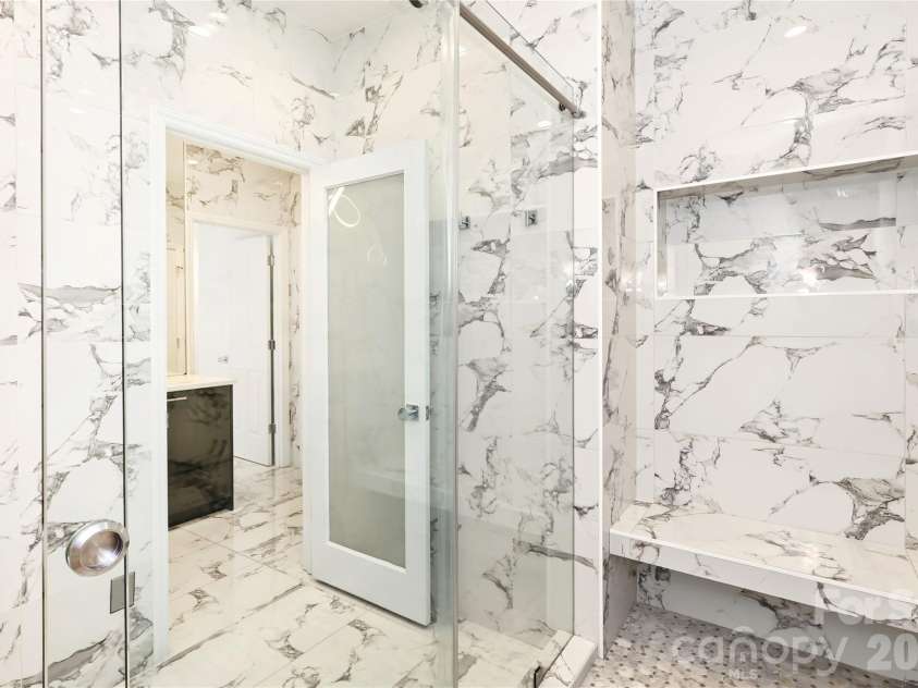5235 Haynes Hall Place, Charlotte, NC 28270.  MLS# CAR4428075, YatesRealty ID 53175. You may never leave this shower!