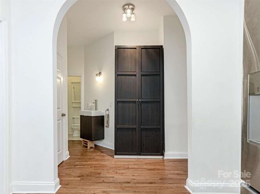 1921 Union Street, Charlotte, NC 28205.  MLS# CAR4222897, YatesRealty ID 5320. Arched architectural wall to hallway