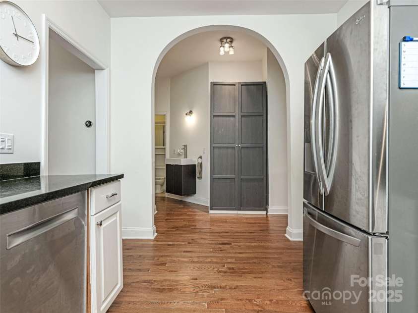 1921 Union Street, Charlotte, NC 28205.  MLS# CAR4222897, YatesRealty ID 5320. Kitchen with arched wall to hallway