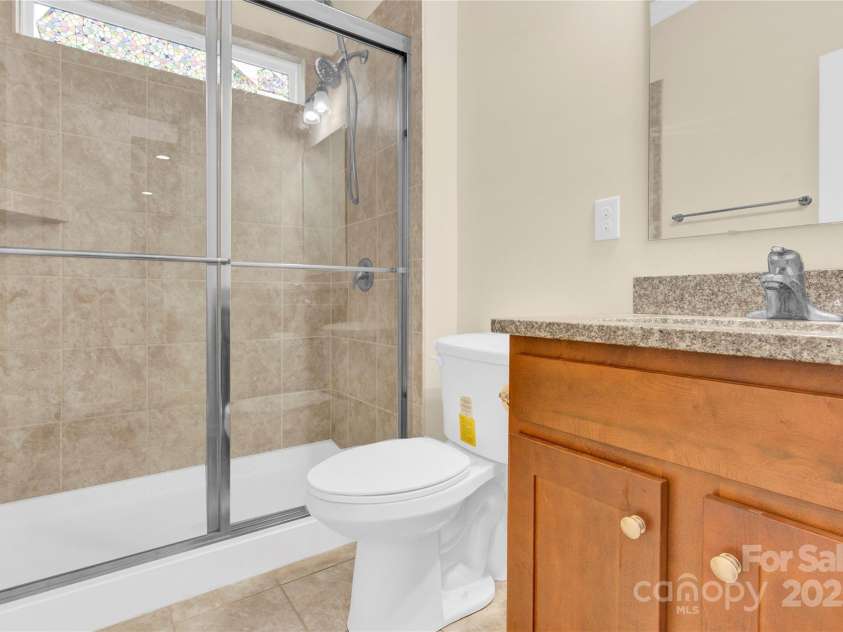 982 Old Trace Road, Concord, NC 28027.  MLS# CAR4228306, YatesRealty ID 5321. Guest Suite Bathroom