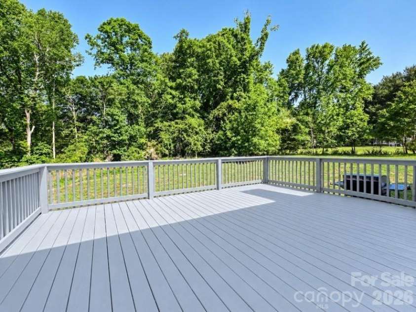 9565 Man O War Road, Indian Land, SC 29707.  MLS# CAR4428560, YatesRealty ID 53219. The oversized deck is great for entertaining!