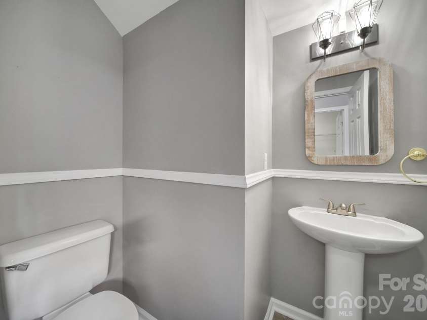 5228 Moonlight Trail, Concord, NC 28025.  MLS# CAR4425207, YatesRealty ID 53223. Half Bath
