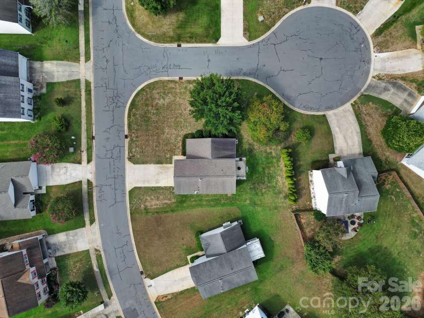 5228 Moonlight Trail, Concord, NC 28025.  MLS# CAR4425207, YatesRealty ID 53223. Large corner lot with trees for privacy.