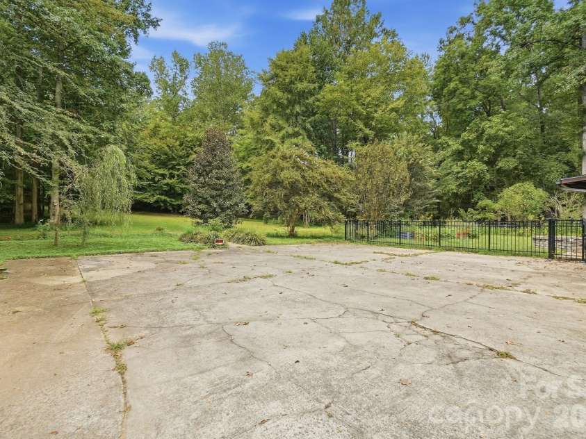 8866 Oldenburg Drive, Mount Pleasant, NC 28124.  MLS# CAR4427588, YatesRealty ID 53252. Extra driveway space for your 'toys'.