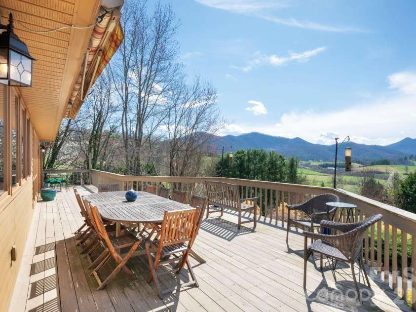 25 New Morning Place, Leicester, NC 28748.  MLS# CAR4356368, YatesRealty ID 5326. Panoramic long range views