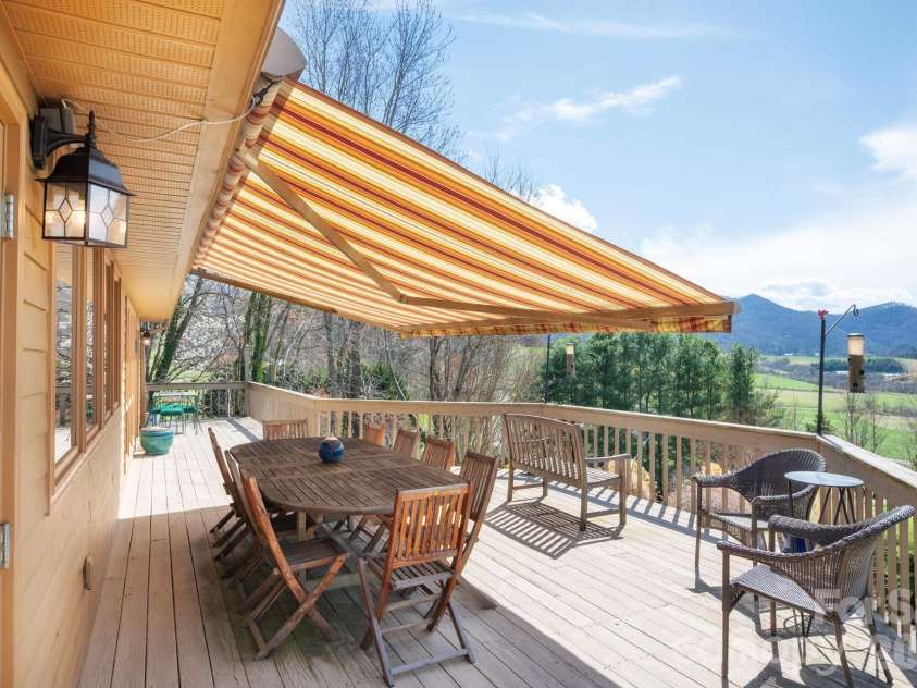 25 New Morning Place, Leicester, NC 28748.  MLS# CAR4356368, YatesRealty ID 5326. Retractable awning
