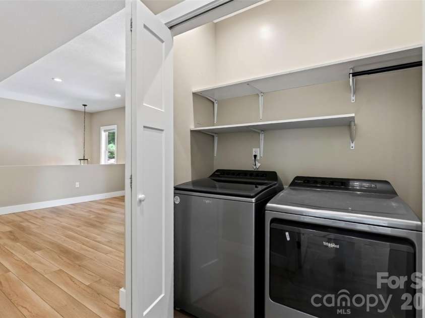 131 Ridge Road, Candler, NC 28715.  MLS# CAR4427732, YatesRealty ID 53263. Convenient washer/dryer on main level