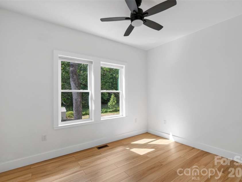 131 Ridge Road, Candler, NC 28715.  MLS# CAR4427732, YatesRealty ID 53263. Guest bedroom 1