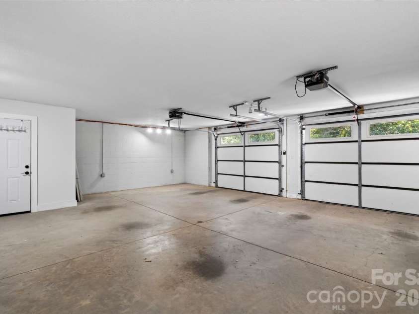 131 Ridge Road, Candler, NC 28715.  MLS# CAR4427732, YatesRealty ID 53263. Oversized 2 car garage