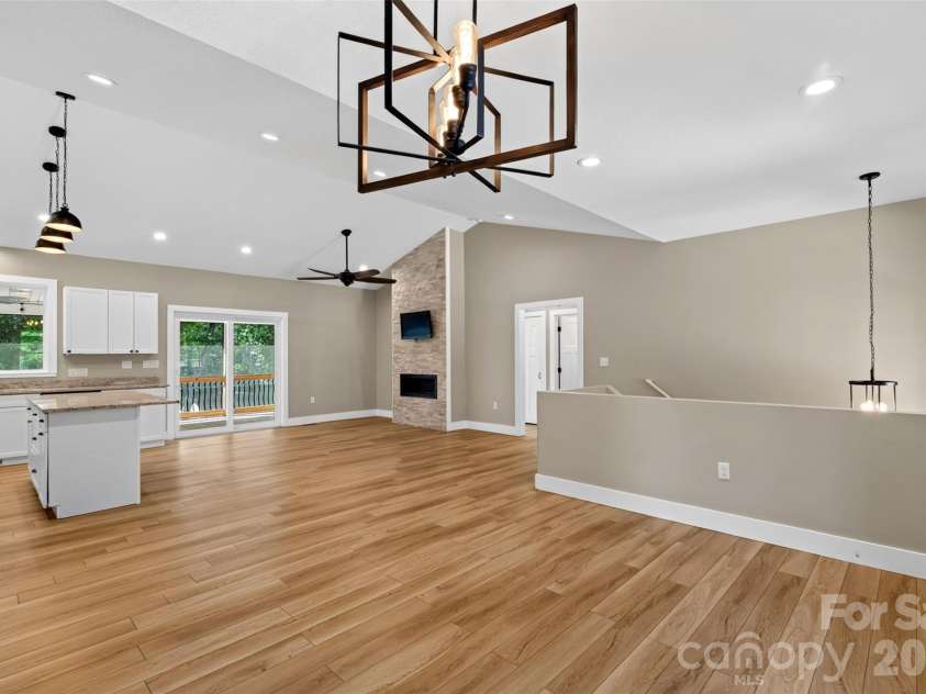 131 Ridge Road, Candler, NC 28715.  MLS# CAR4427732, YatesRealty ID 53263. Welcoming great room