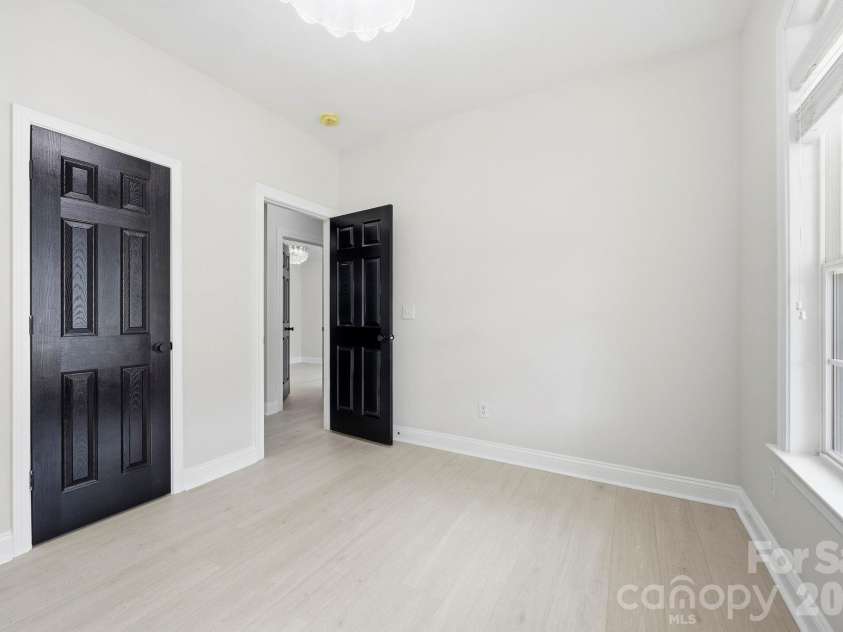 1268 Saint Johns Avenue, Stallings, NC 28104.  MLS# CAR4422083, YatesRealty ID 53269. Main Level Front Bedroom