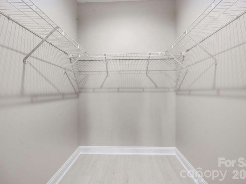 1268 Saint Johns Avenue, Stallings, NC 28104.  MLS# CAR4422083, YatesRealty ID 53269. Primary Closet