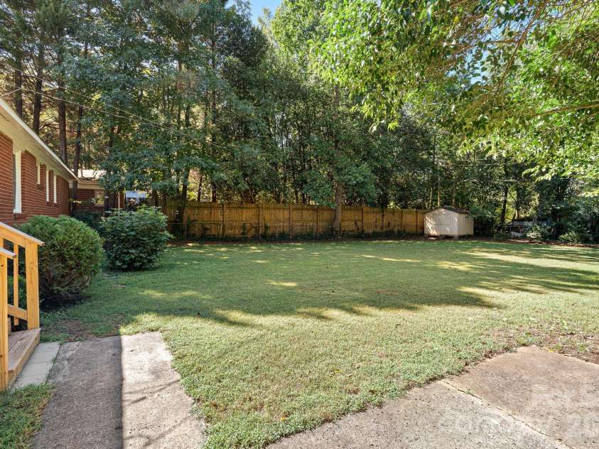 1914 Kilborne Drive, Charlotte, NC 28205.  MLS# CAR4428533, YatesRealty ID 53289. Flat back yard is fenced.