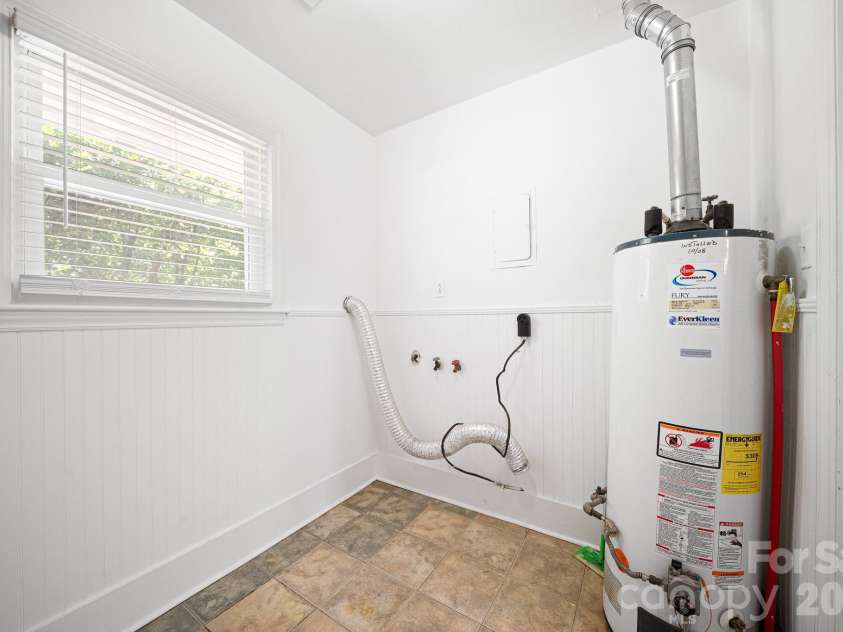 1914 Kilborne Drive, Charlotte, NC 28205.  MLS# CAR4428533, YatesRealty ID 53289. Utility / Laundry Room with extra storage