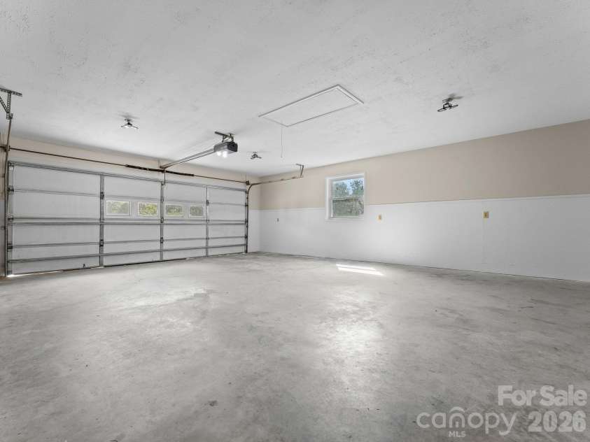 106 Mohican Trail, East Flat Rock, NC 28726.  MLS# CAR4427684, YatesRealty ID 53292. 2 car oversized garage