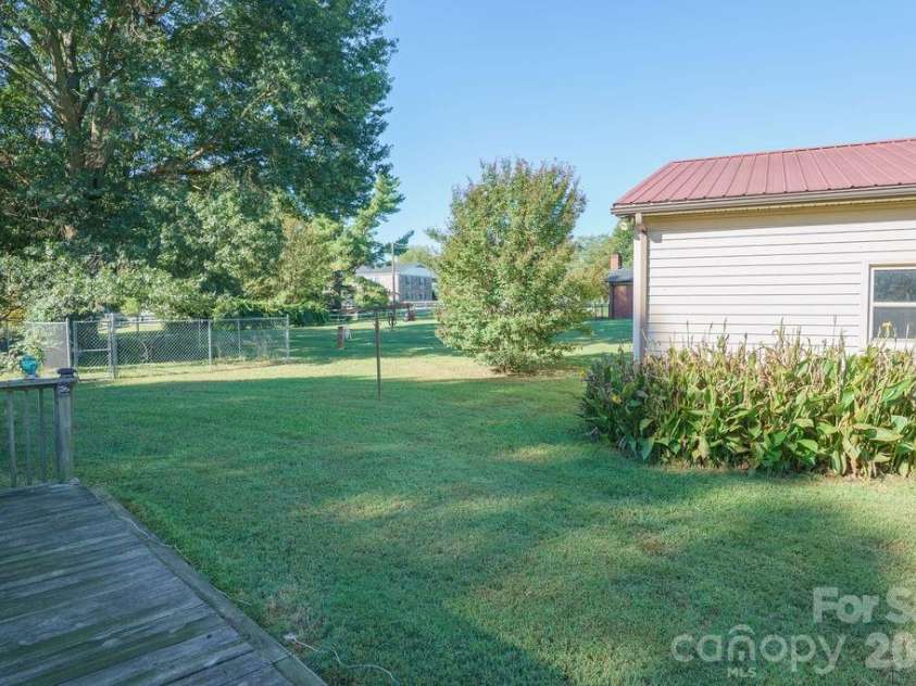 217 Salisbury Street, Rockwell, NC 28138.  MLS# CAR4428797, YatesRealty ID 53299. Backyard