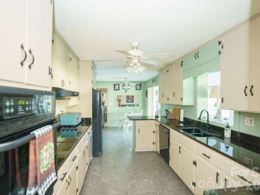 217 Salisbury Street, Rockwell, NC 28138.  MLS# CAR4428797, YatesRealty ID 53299. Kitchen 3