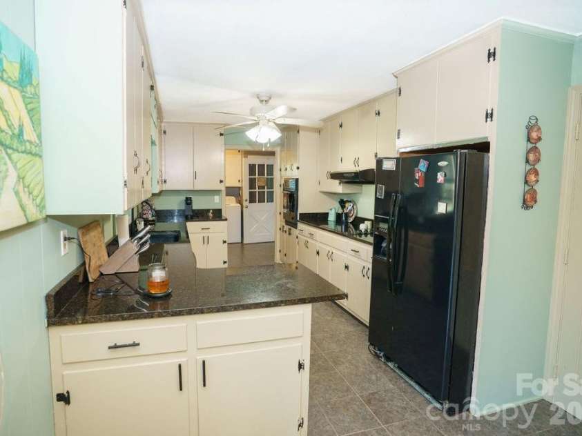 217 Salisbury Street, Rockwell, NC 28138.  MLS# CAR4428797, YatesRealty ID 53299. Kitchen
