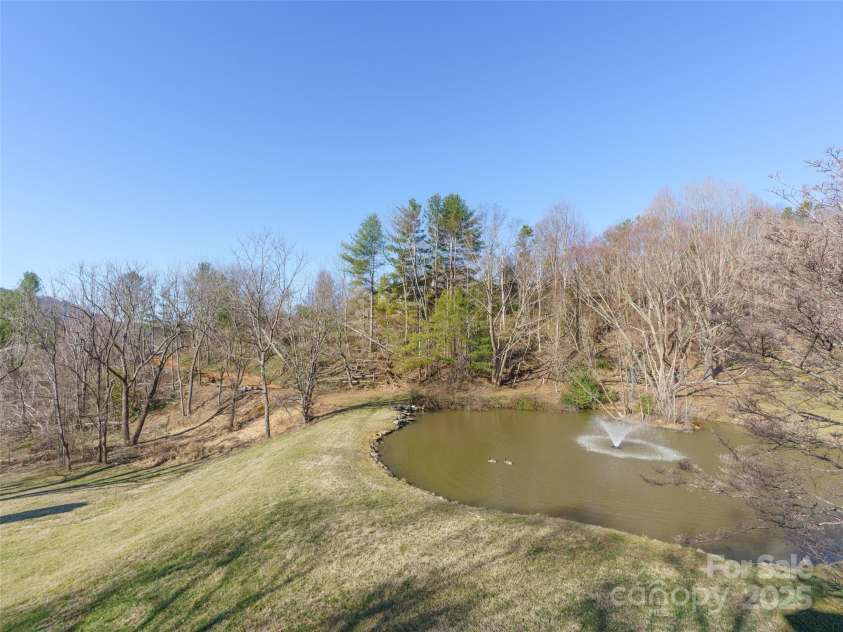 15 Ridge Terrace, Asheville, NC 28804.  MLS# CAR4245489, YatesRealty ID 5331. Pond  The fountain is on a timer and turns on at 9:30 am and off at night