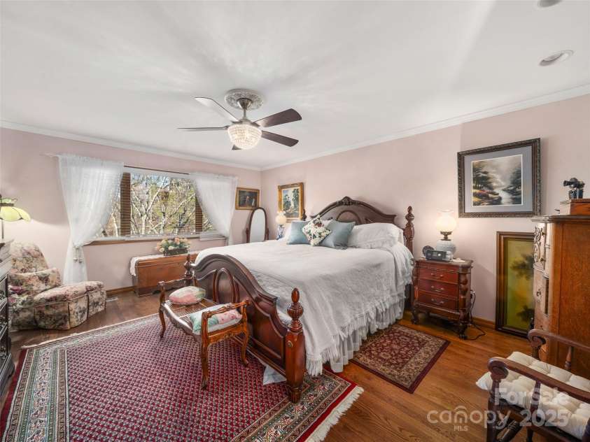 15 Ridge Terrace, Asheville, NC 28804.  MLS# CAR4245489, YatesRealty ID 5331. Primary bedroom has a window that overlooks the pond
